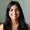 Photo of Priya S., an office manager and GreenThumb Solutions client